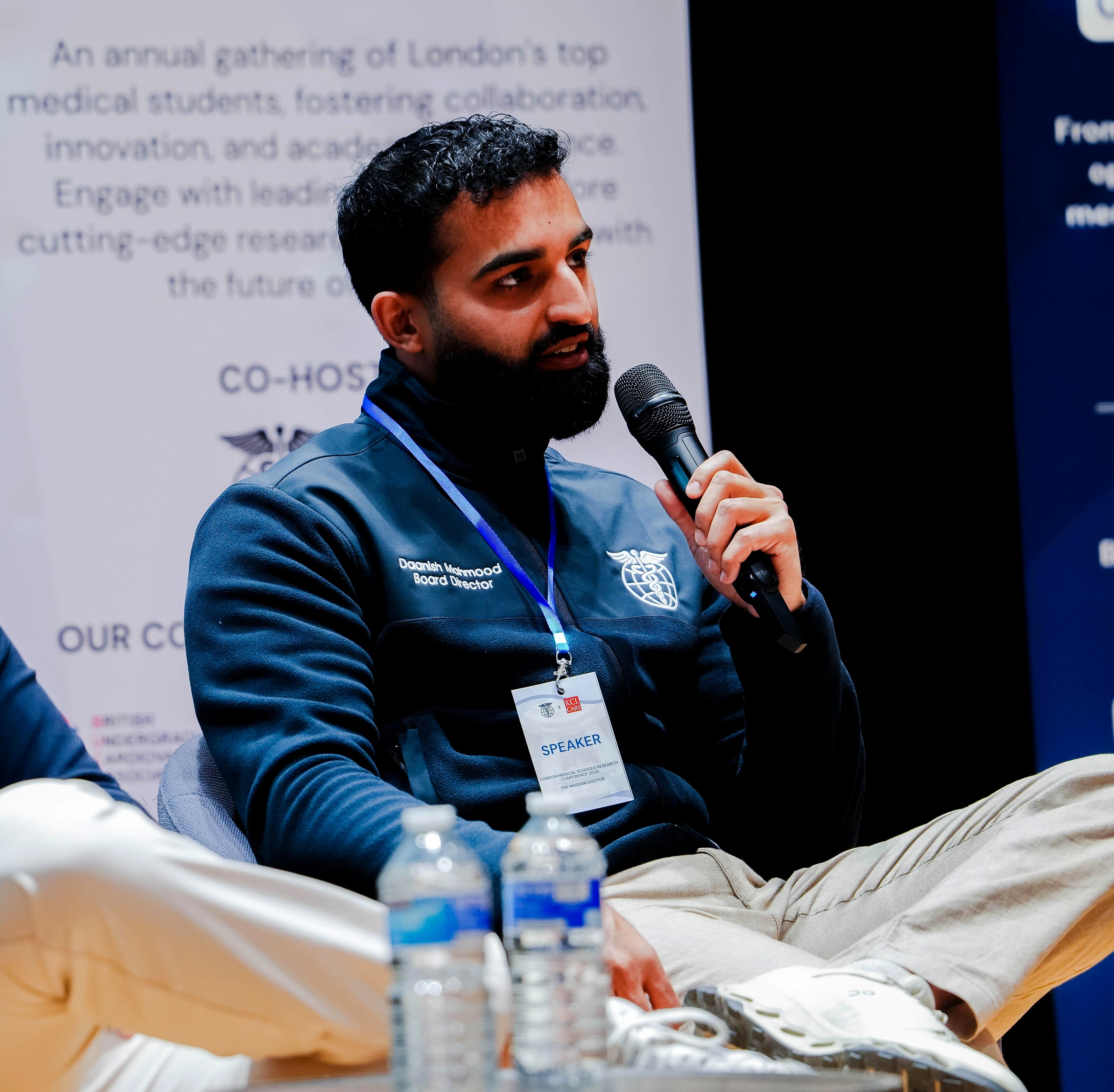 Dr Daanish speaking at a conference panel